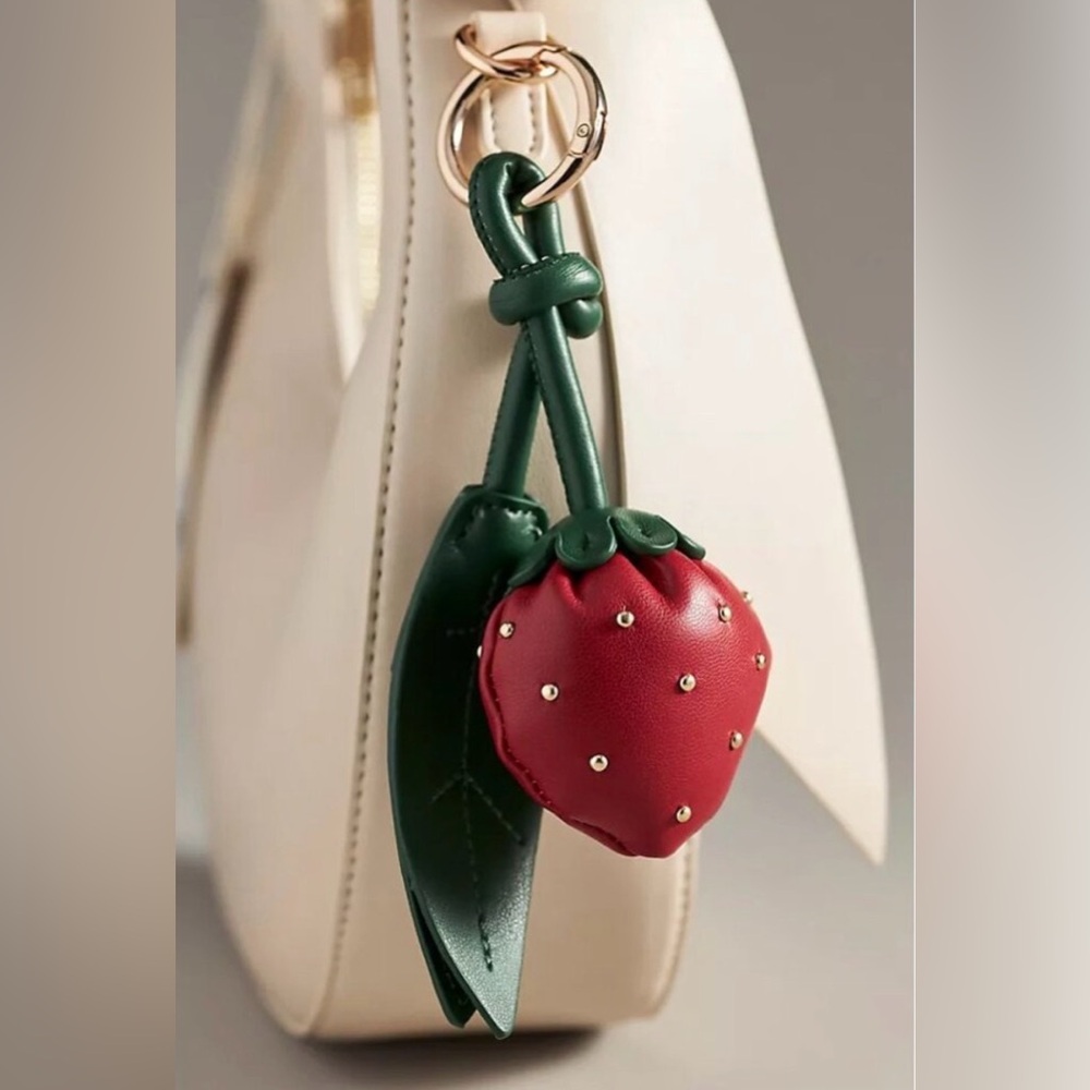 Melie Bianco Cream Mini Bag with Red Strawberry Charm